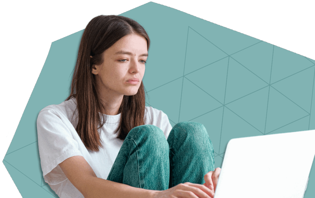 An image of a woman on a computer.