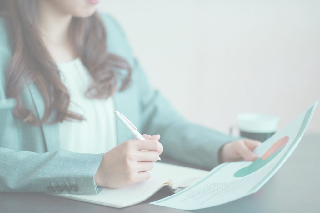 An image of a woman looking at a mental health report.
