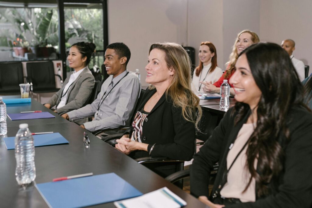 An image of employees attending a workplace mental health training session together.