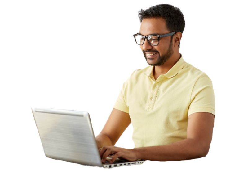 An image of a man using a computer.