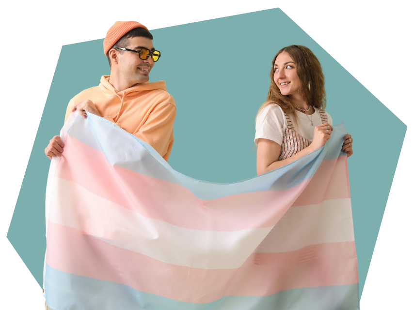 An image of two people holding a transgender pride flag.